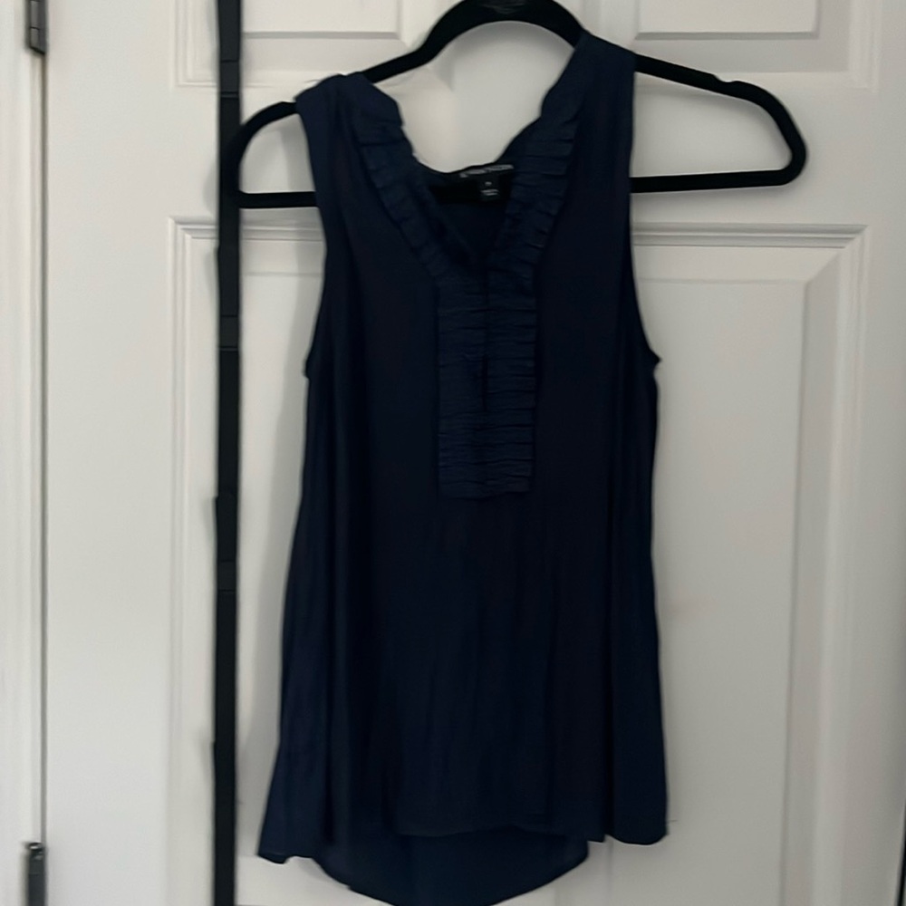 Cute navy blue top with ruffle in front